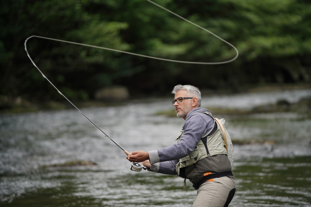 Fly Fishing for Bass: Fly Fisherman Fishing