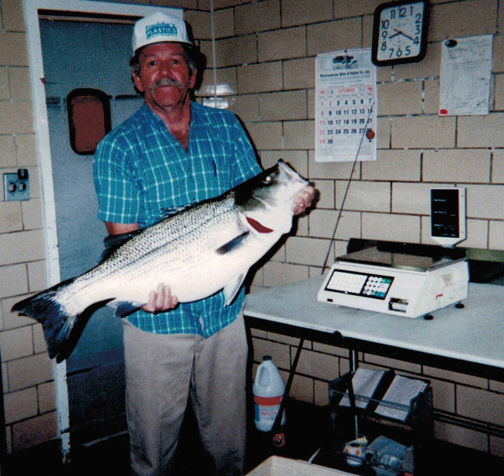 E.H. Hodgins set the bass fishing records in Alabama for hybrid bass.