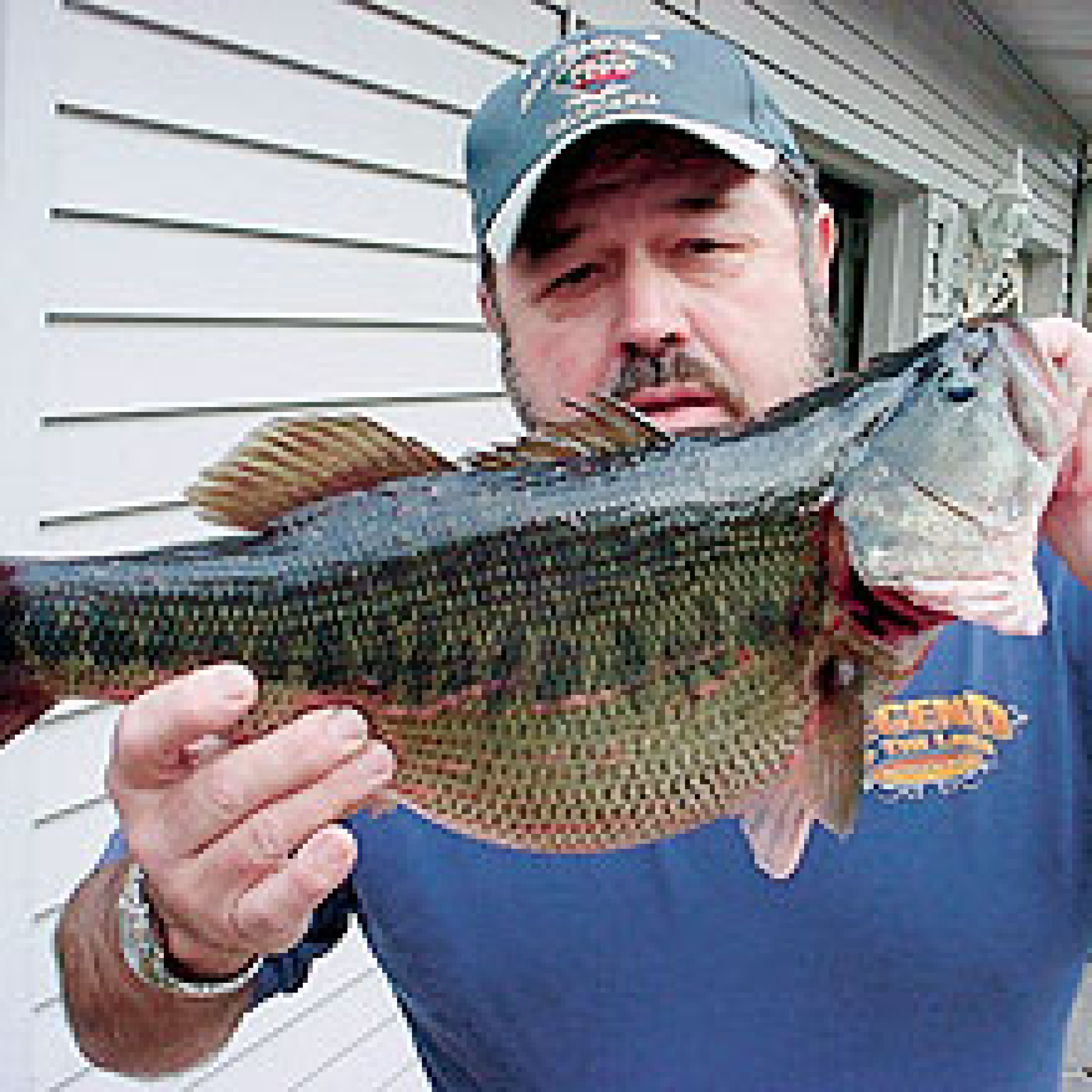 Wayne Holland set the Georgia bass fishing record for spotted bass.