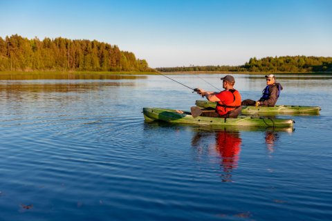 Two men fishing on kayaks